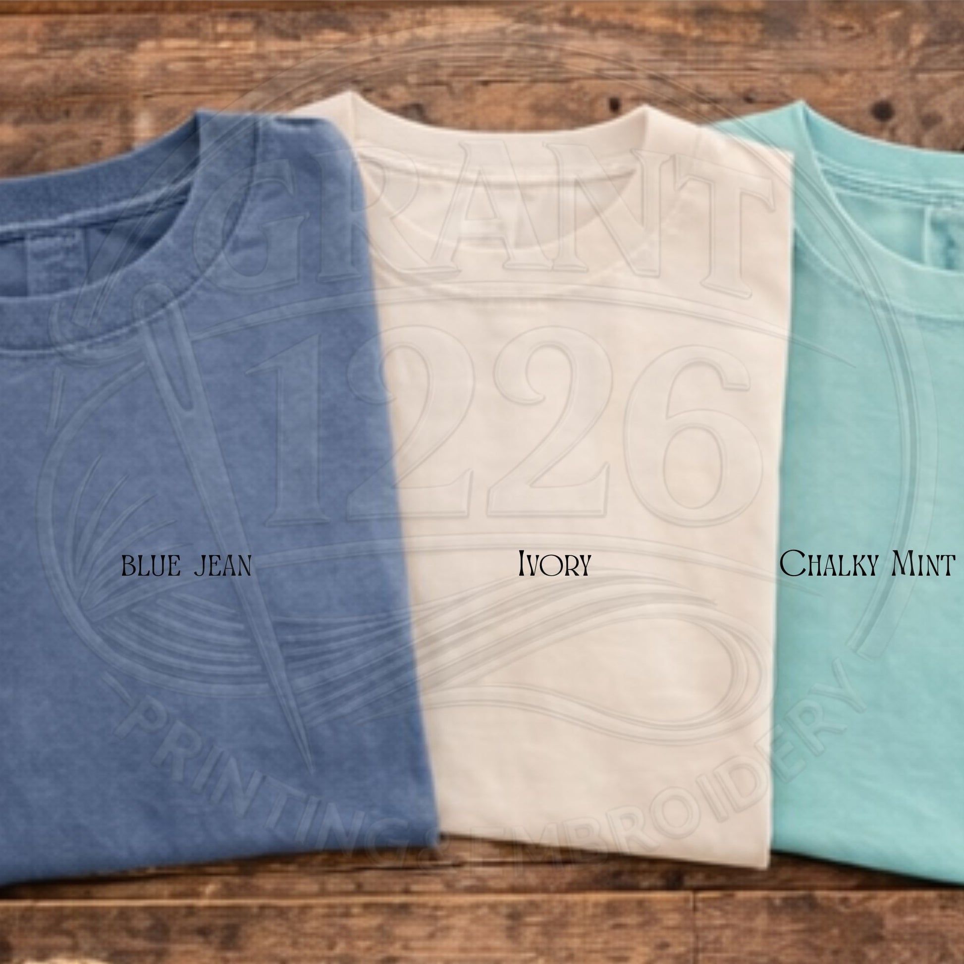 Color choices blue, ivory, and chalky mint on a wooden surface.