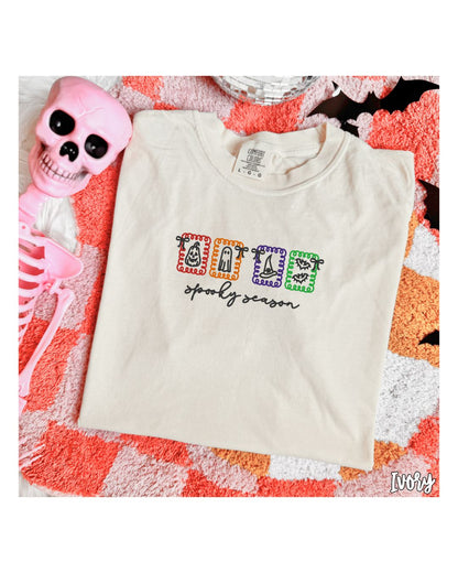 Ivory Comfort Colors short-sleeve embroidered Spooky Season shirt with pumpkin ghost witch hat and bats