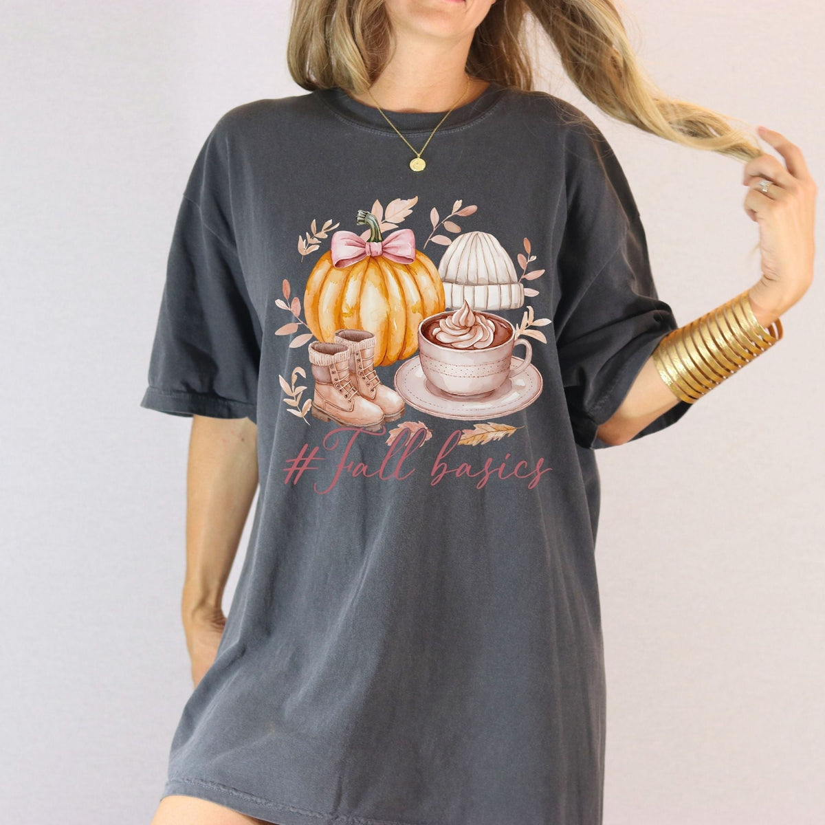 Model wearing oversized Pepper Comfort Colors Fall Basics pumpkin and coffee shirt