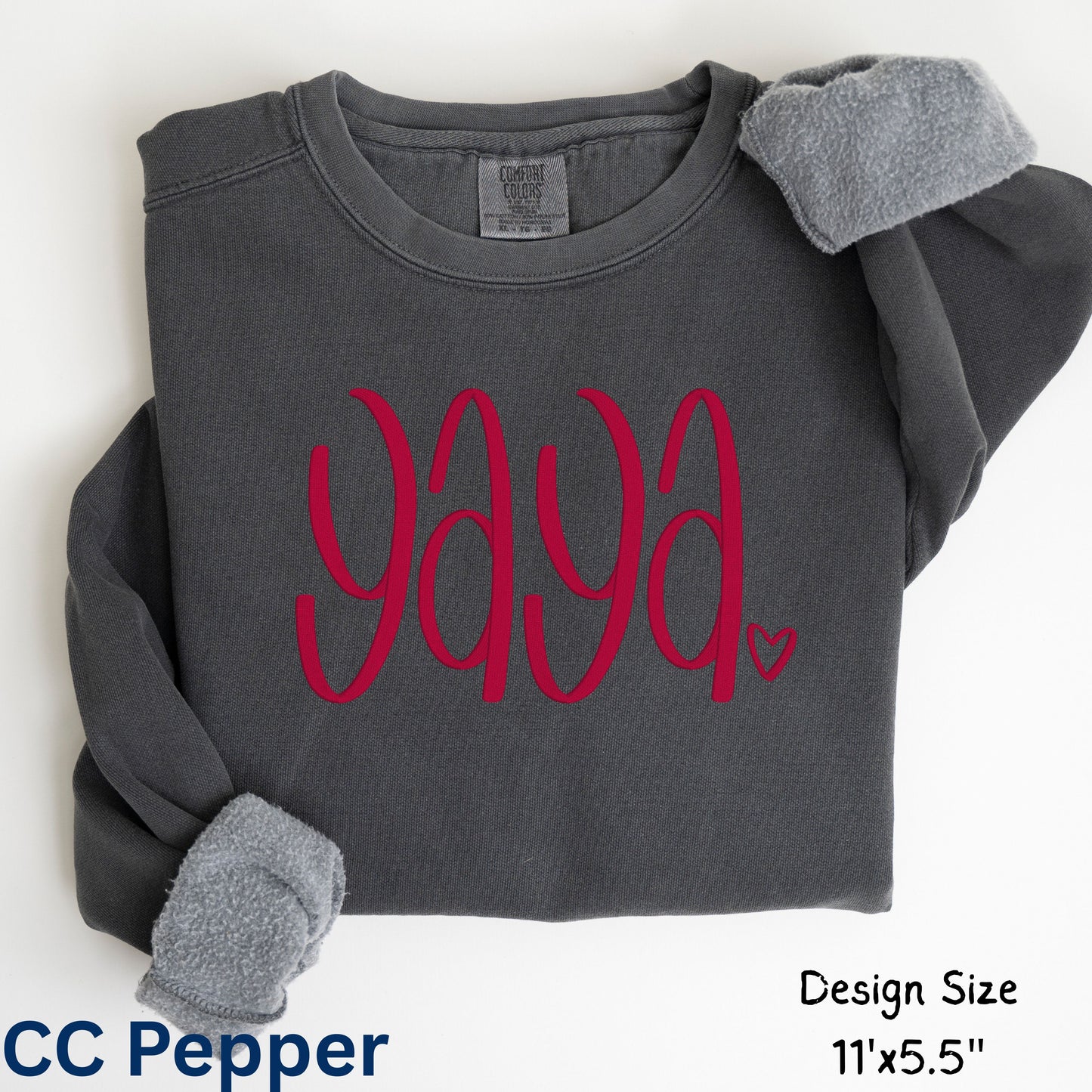 Pepper sweatshirt with pink 'Yaya' text on a white background