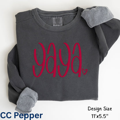 Pepper sweatshirt with pink 'Yaya' text on a white background