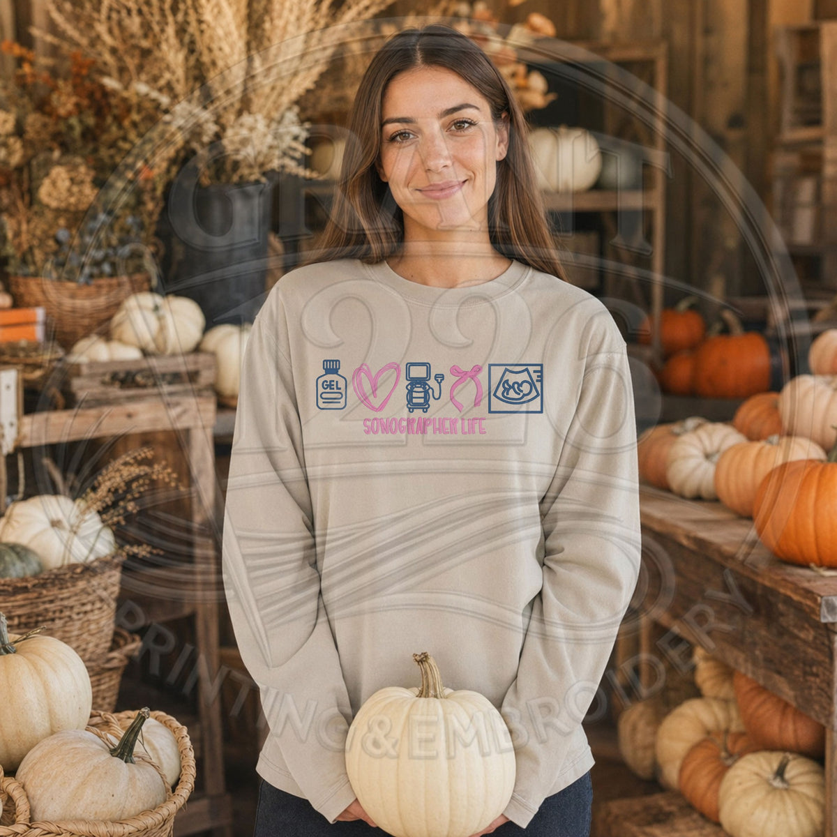 Long-sleeve Comfort Colors sonographer shirt with an embroidered chest design
