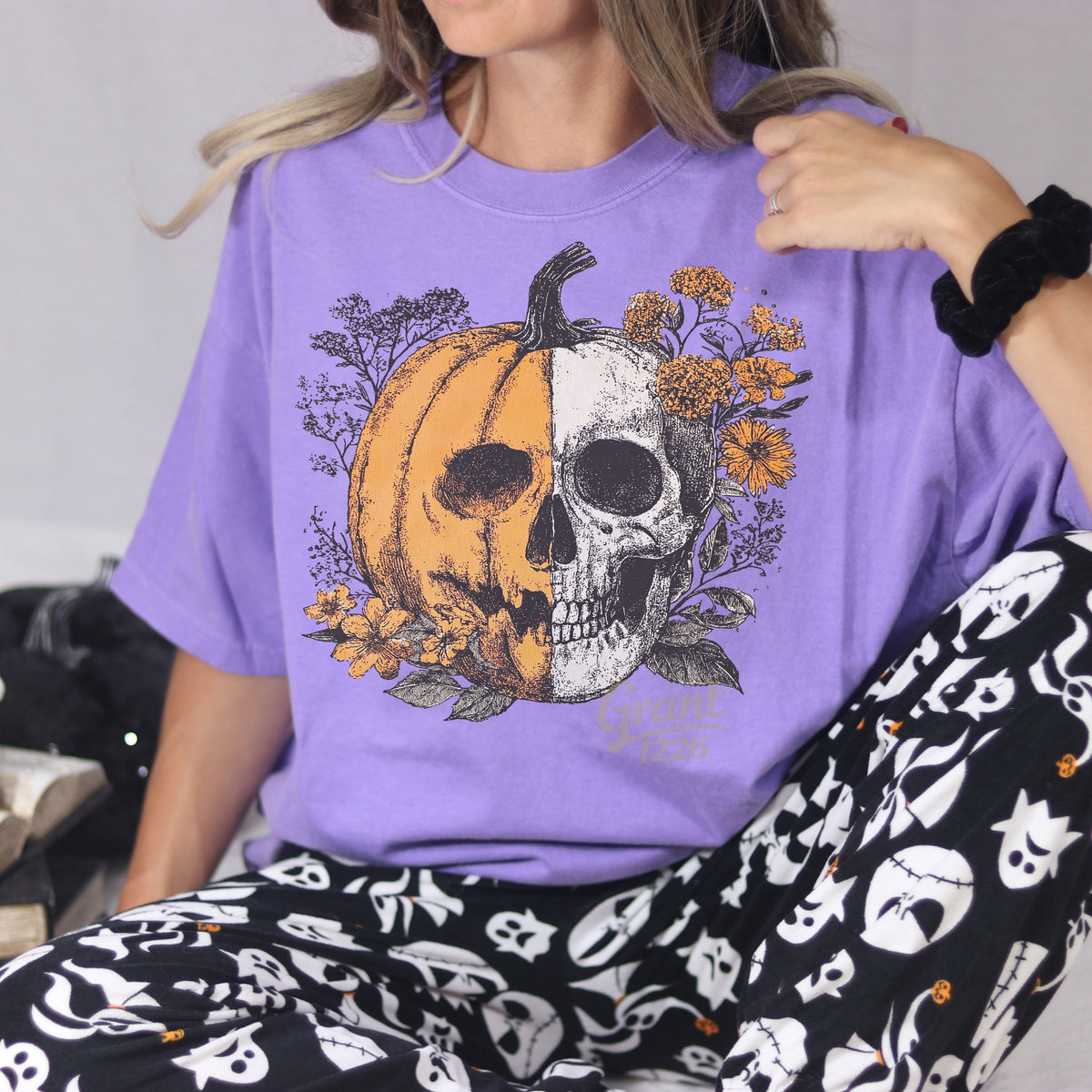 Comfort Colors Violet floral pumpkin skull shirt styled for spooky season