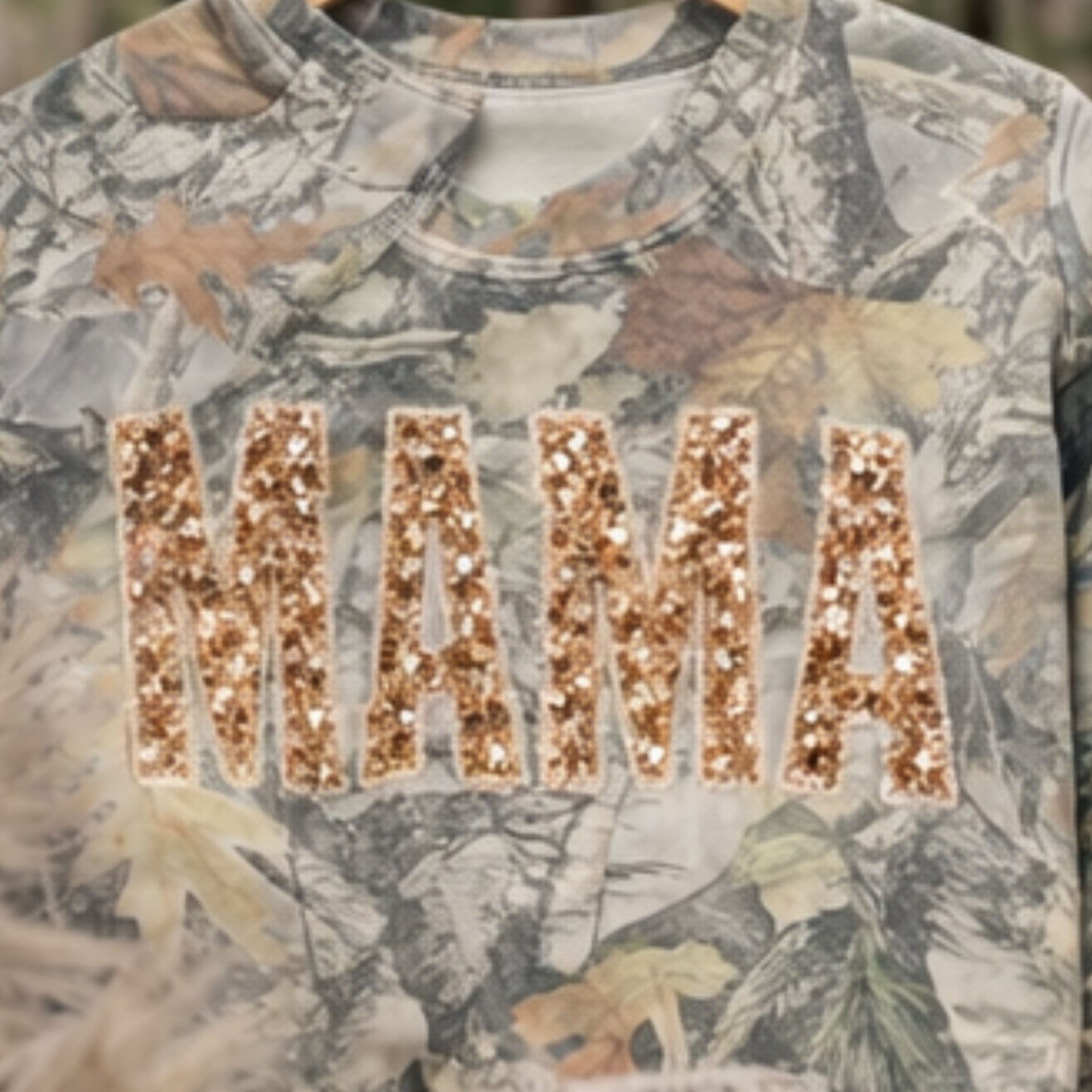 Camouflage shirt with 'MAMA' in gold sequins on a camo crewneck
