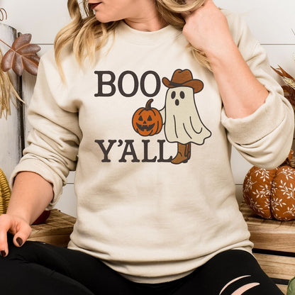 Sand Gildan crewneck with an embroidered cowboy ghost and Boo Y'all lettering