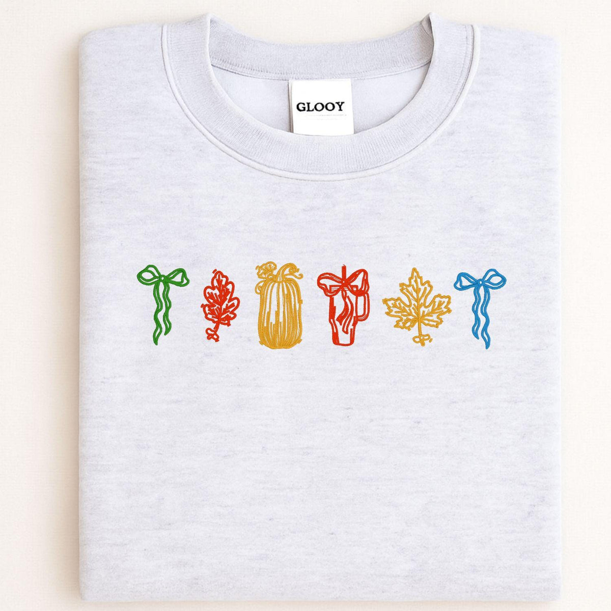 Sport gray fall icons embroidered crewneck folded for a front view