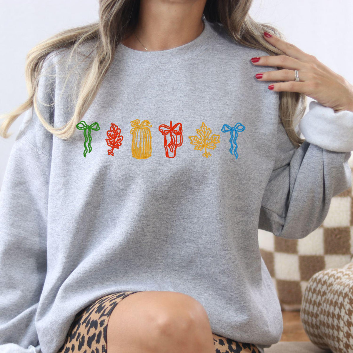 Sport gray cozy fall embroidery sweatshirt modeled indoors