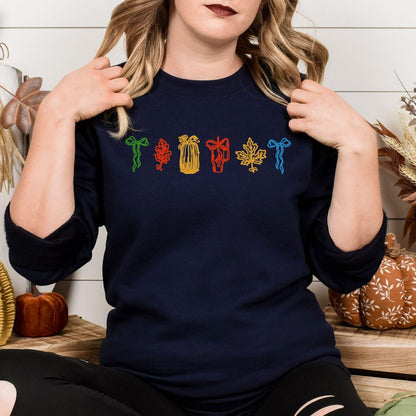Navy cozy fall icons embroidered sweatshirt modeled from the front