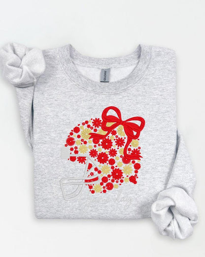Ash Gildan sweatshirt with red floral football helmet Game Day embroidery