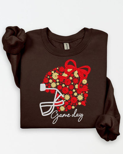 Brown Gildan sweatshirt with red and gold floral football helmet embroidery