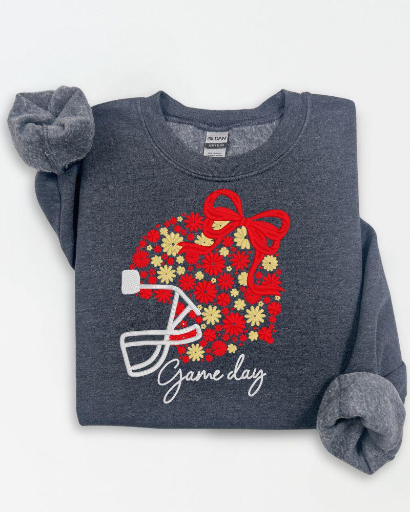 Dark Heather Gildan sweatshirt with red and gold floral football helmet embroidery