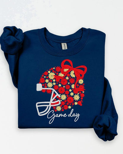 Navy Gildan sweatshirt with floral football helmet bow and Game Day embroidery