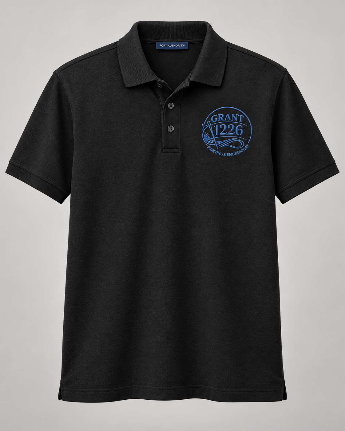 Black Port Authority K100 work polo with navy Grant 1226 left-chest embroidery, front product view