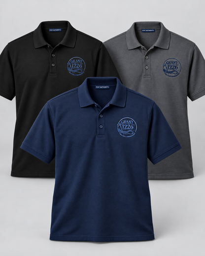 Black navy and charcoal Port Authority K100 work polos with Grant 1226 left-chest embroidery