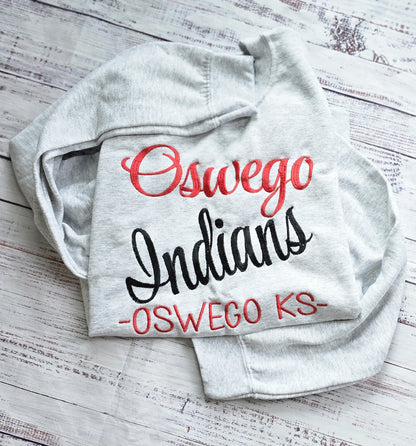 Ash crewneck showing large full-chest custom word embroidery