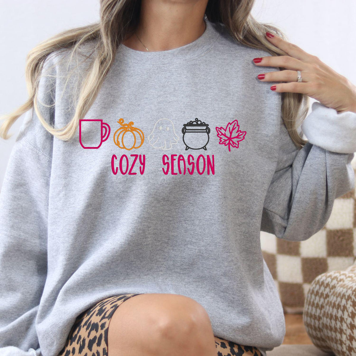 Ash fall Halloween embroidered crewneck featuring ghost, pumpkin, coffee mug, cauldron and leaf