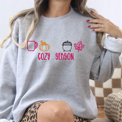 Ash fall Halloween embroidered crewneck featuring ghost, pumpkin, coffee mug, cauldron and leaf