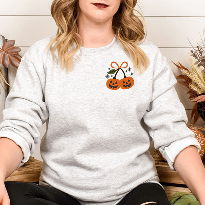 Ash cute fall sweatshirt with a small pumpkin pair embroidered on the chest