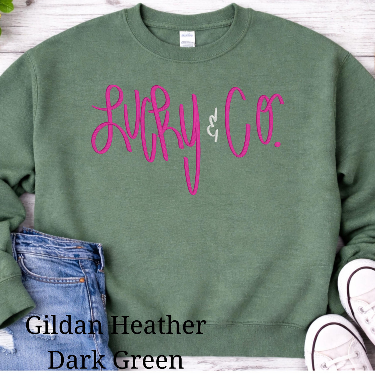 Dark Green St. Patrick’s Day crewneck with embroidered shamrock design