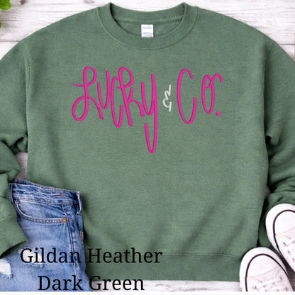 Dark Green St. Patrick’s Day crewneck with embroidered shamrock design