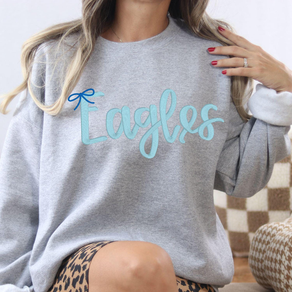 Sport gray Eagles script embroidered crewneck shown from the front