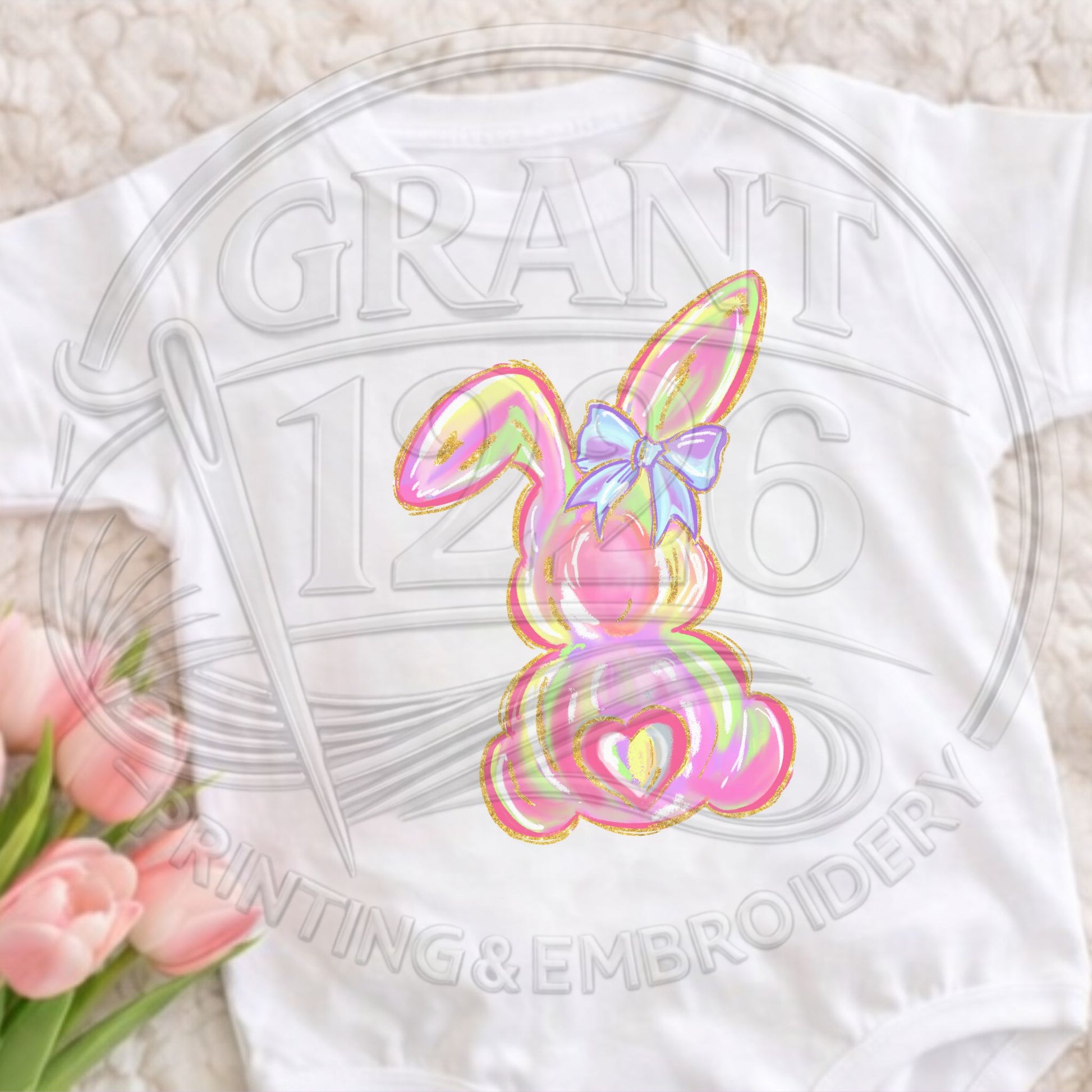 Baby Easter bunny onesie in white with colorful pastel design