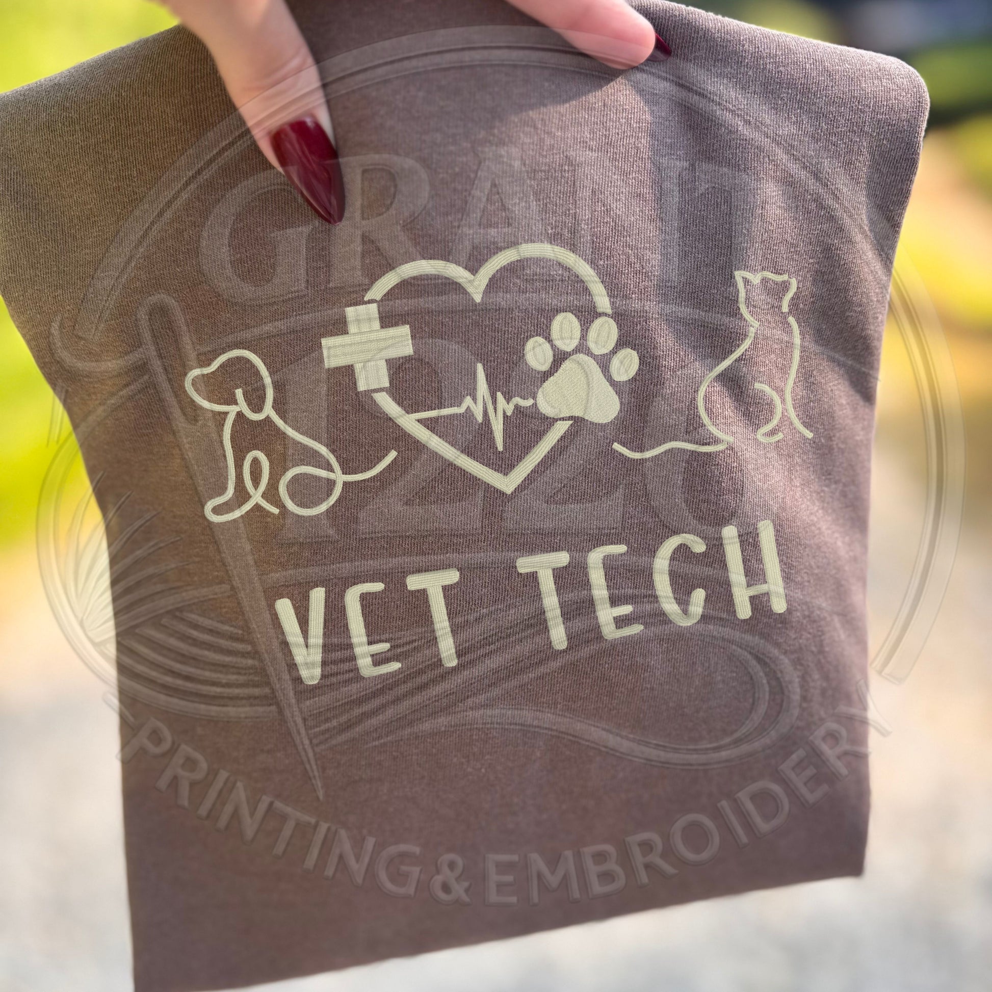 Embroidered vet tech shirt with dog cat heartbeat paw print design on espresso Comfort Colors tee