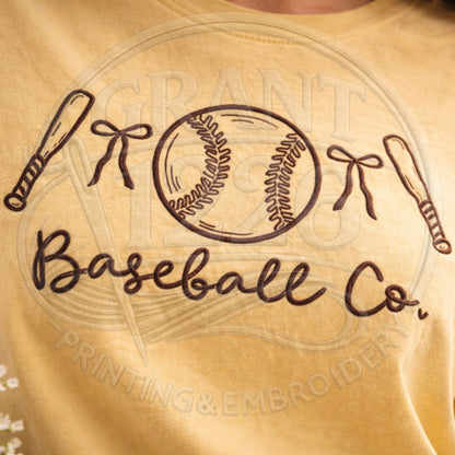 Close up embroidery detail on Baseball Co sports shirt