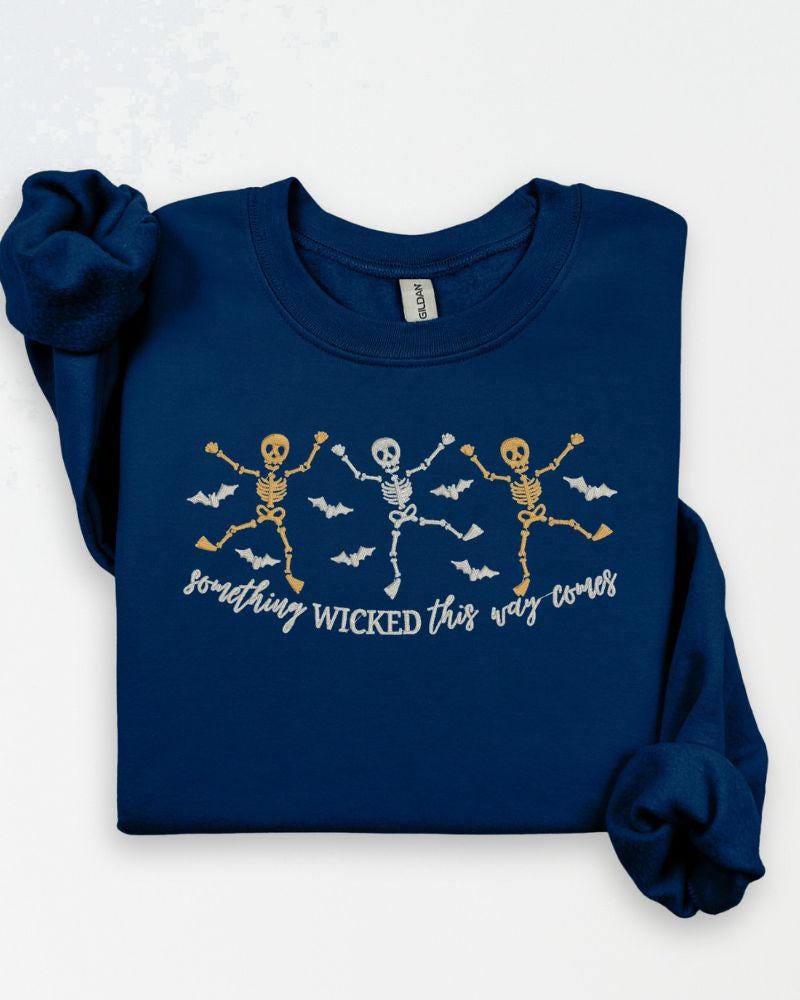 Unisex embroidered skeleton Halloween crewneck with bats and playful dancing skeletons