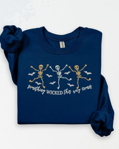 Unisex embroidered skeleton Halloween crewneck with bats and playful dancing skeletons
