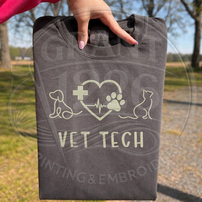 Comfort Colors embroidered vet tech shirt folded flat lay outdoors