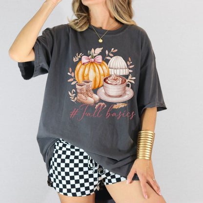Pepper fall graphic shirt featuring pumpkin coffee cup boots knit hat and Fall Basics lettering