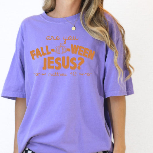 Close view of an Orchid Comfort Colors shirt with the orange Are You Fall-O-Ween Jesus Matthew 4:19 design.