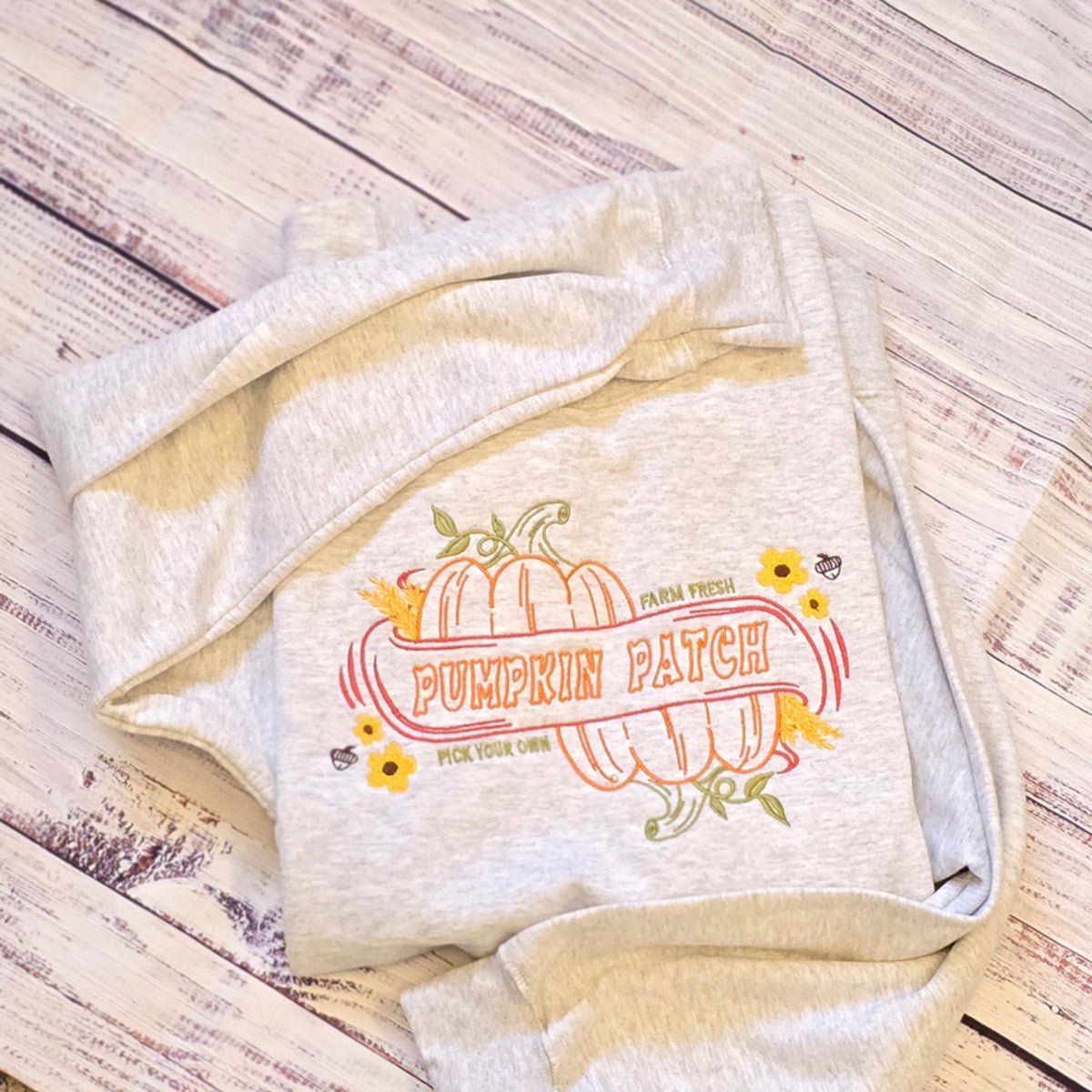 Ash crewneck sweatshirt embroidered with Farm Fresh Pumpkin Patch and Pick Your Own design