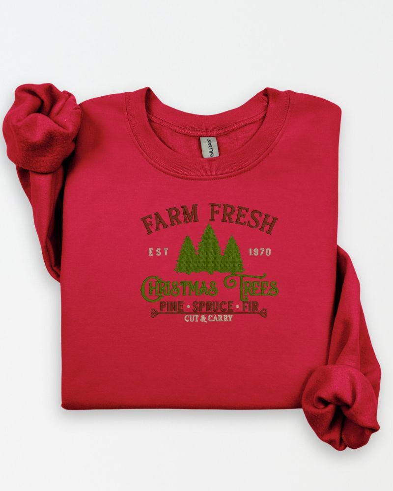 Farmhouse Christmas tree farm embroidered sweatshirt styled for a cozy winter outfit.