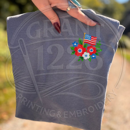 Blue Jean patriotic embroidered T-shirt with red white and blue floral American flag
