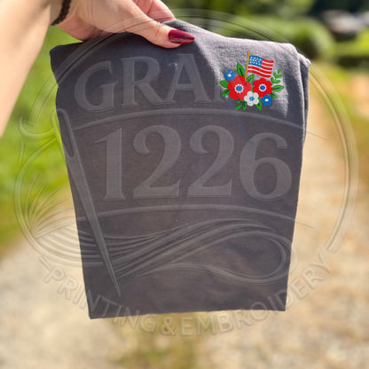 Charcoal patriotic embroidered T-shirt with red white and blue floral flag