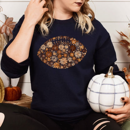 Navy Gildan 18000 floral football sweatshirt styled for a fall game day