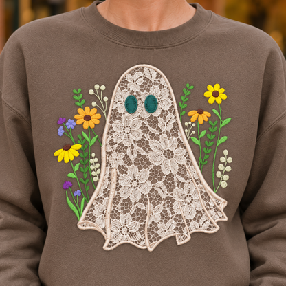 Detailed view of floral lace ghost appliqué and dimensional wildflower stitching on Brown Savanna