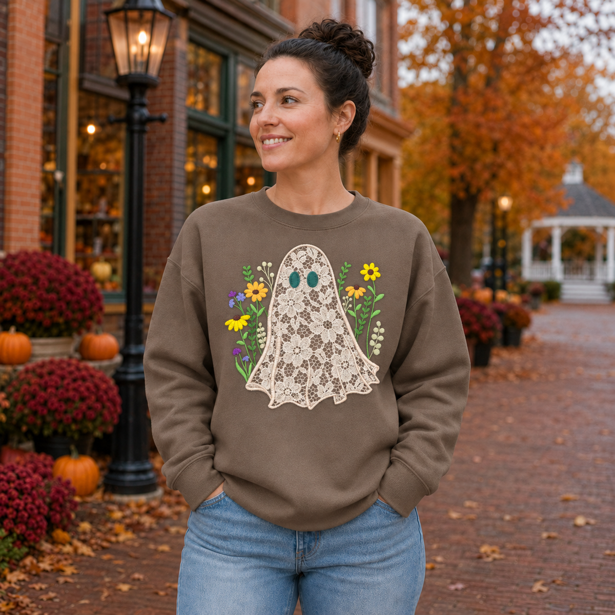 Brown Savanna sweatshirt featuring a centered floral lace ghost appliqué with embroidered wildflowers