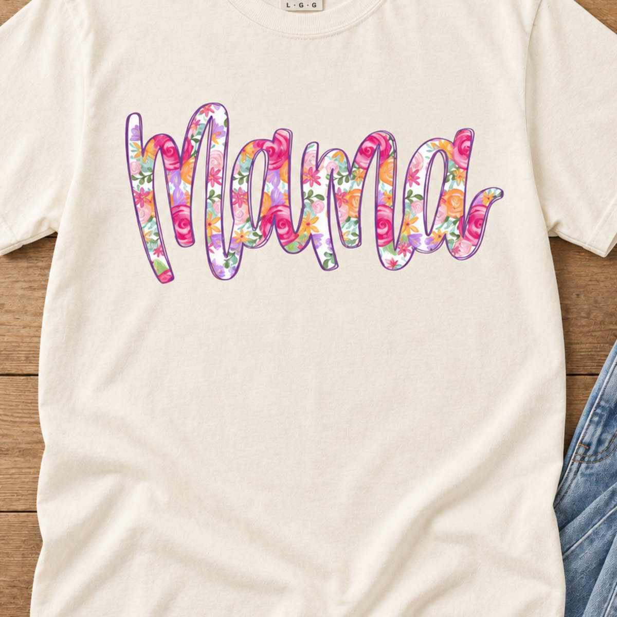 Close-up of colorful floral Mama print on Ivory shirt