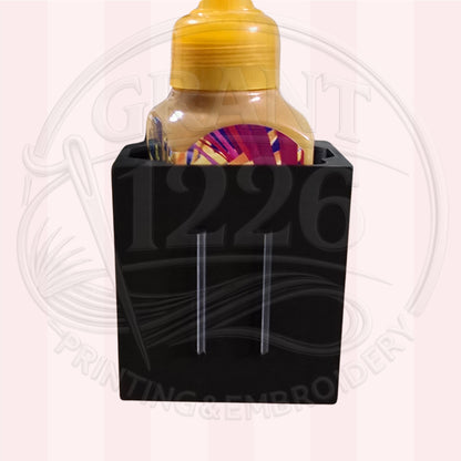Back view of black 3D printed foaming soap holder showing faceplate attachment slots