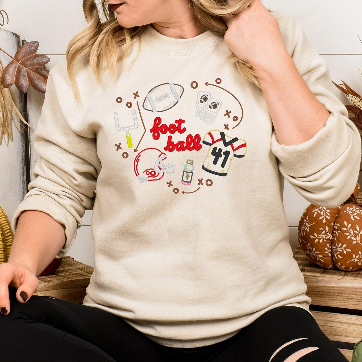 Sand embroidered football sweatshirt styled for a fall game day outfit