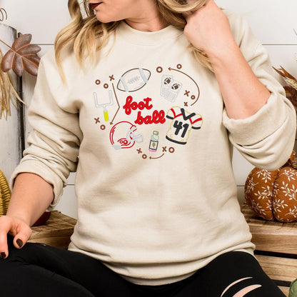 Sand embroidered football sweatshirt styled for a fall game day outfit