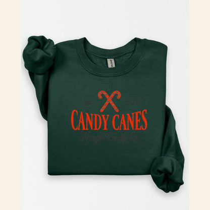 Forest Green Candy Cane Kringle Candy Co embroidered Christmas sweatshirt flat lay