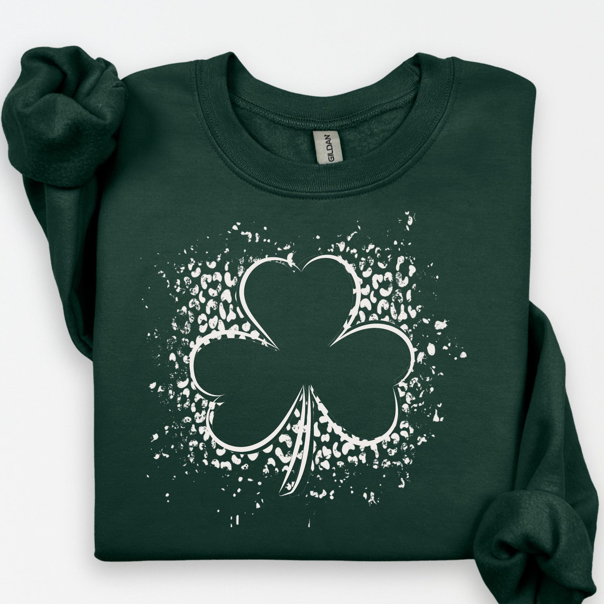 Shamrock graphic design on green holiday sweatshirt