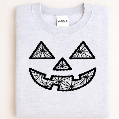 Folded ash gray crewneck with black geometric pumpkin face embroidery