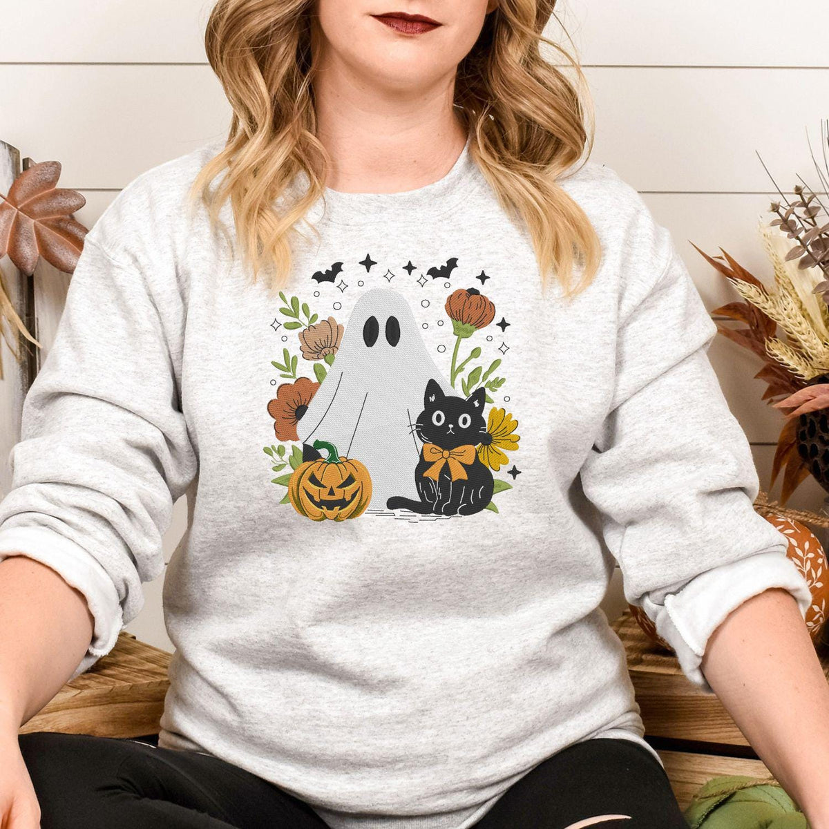 Ash ghost and black cat embroidered sweatshirt with fall flowers and jack-o’-lantern