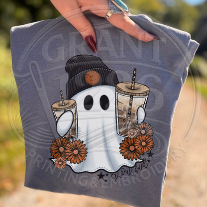 Blue Jean Comfort Colors shirt close-up with ghost, iced coffee, beanie and orange flower graphic