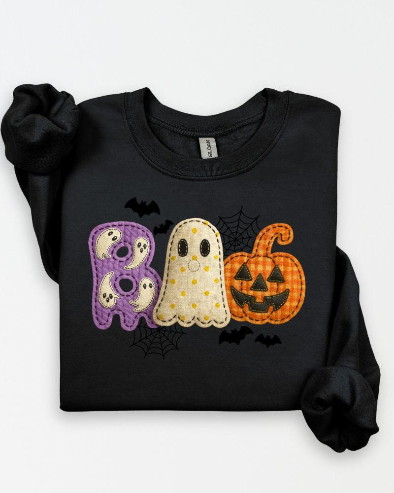 Ghost pumpkin and mini ghost BOO graphic on a Halloween crewneck